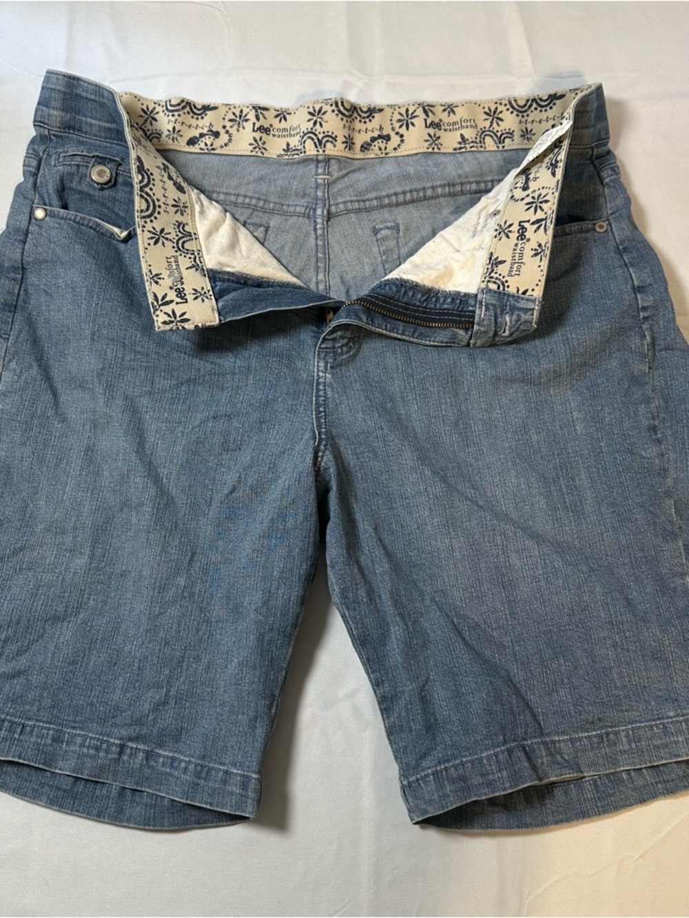 Cowgirl, rodeo. Riders by Lee Light Blue Denim Shorts with Navy Paisley Waistban